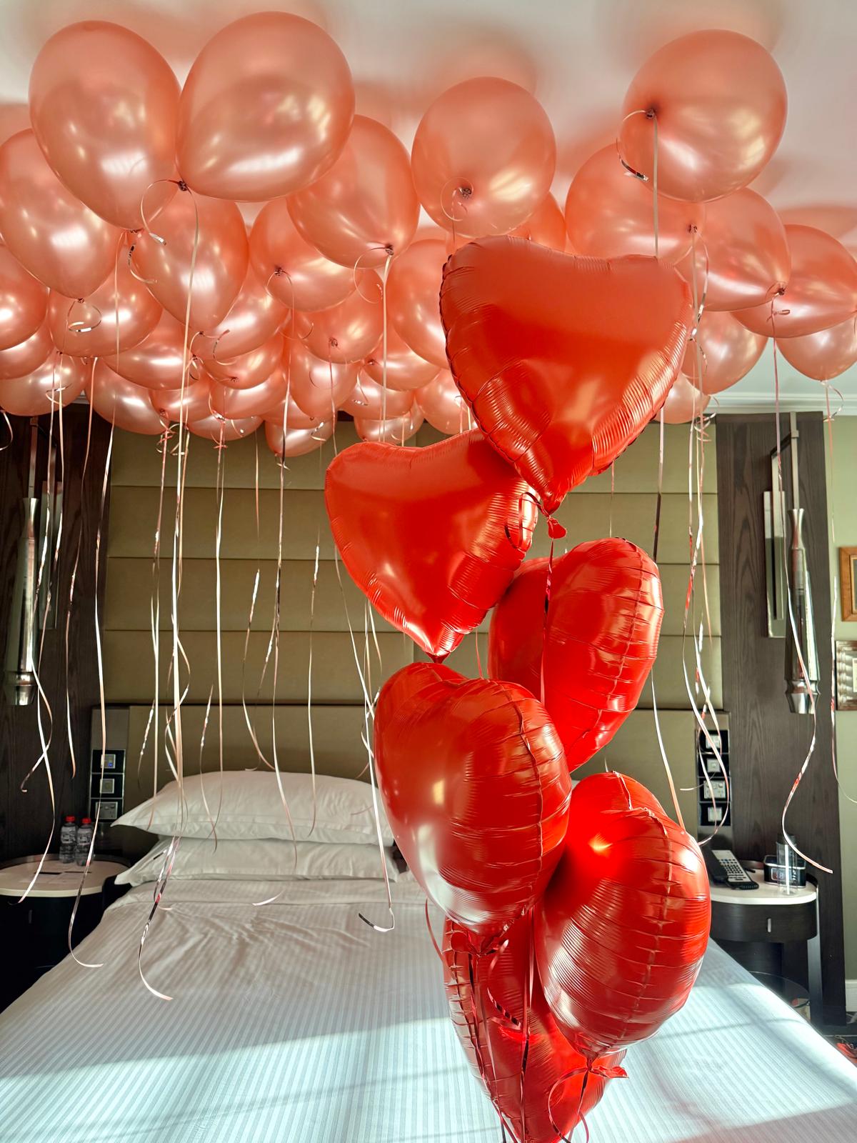 50 ceiling balloons and 6 foil heart helium
